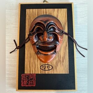 Korean traditional wooden mask (Yangban Tal) mounted on decorative frame